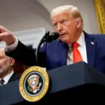 Trump issues tariff threat over foreign trade with Iran